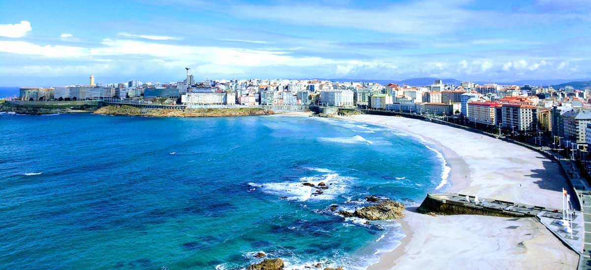 Best Holiday Destinations in Spain Travel Guide - Coruna Beach Skyline